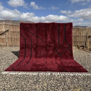 Dark red rug